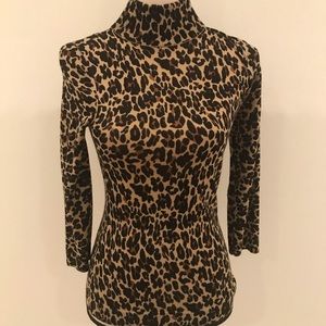 Tory Burch animal print turtleneck